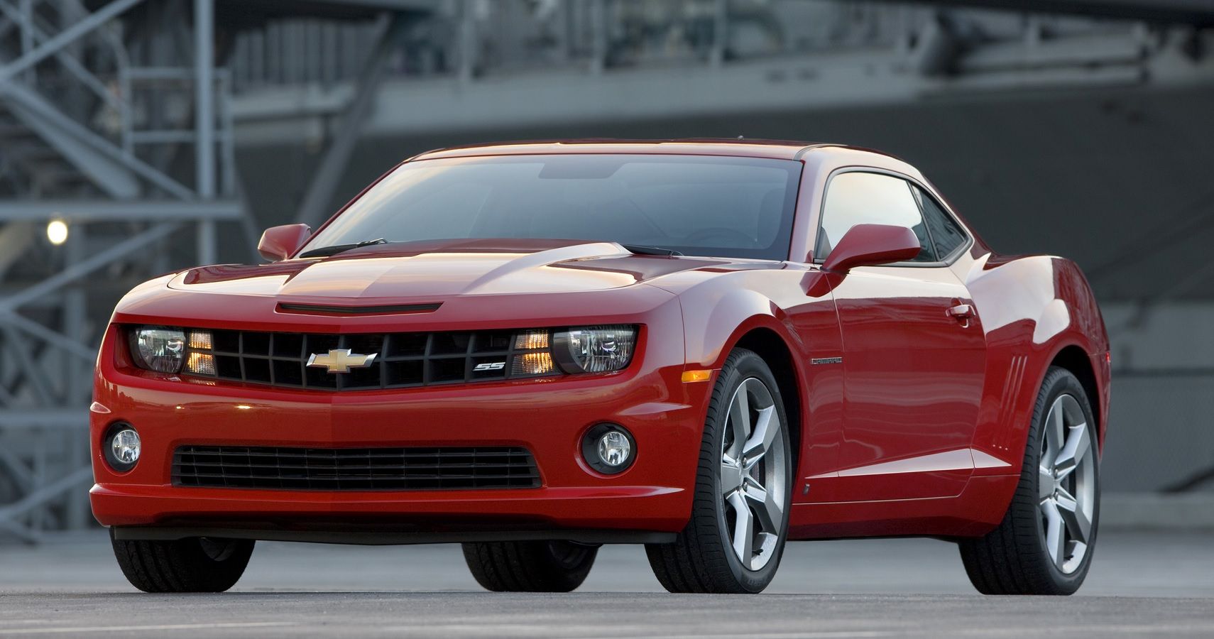 Red 2010 Chevrolet Camaro on the road