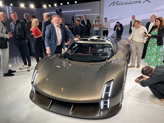 At the launch: Mail motoring reporter Ray Massey with the new Mission X hypercar in Stuttgart