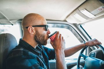 Drivers are only just realising how to fit any size bottle in their cup holder 