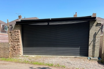 Neighbours say my garage is 50cm too high & made me spend £14k lowering it