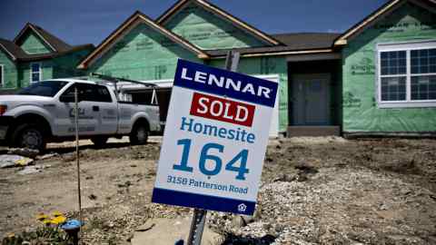 A ‘Sold’ sign displayed outside a home under construction at a Lennar development in Montgomery, Illinois, US