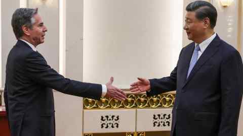 US Secretary of State Antony Blinken, left, shakes hands with China’s President Xi Jinping in the Great Hall of the People in Beijing