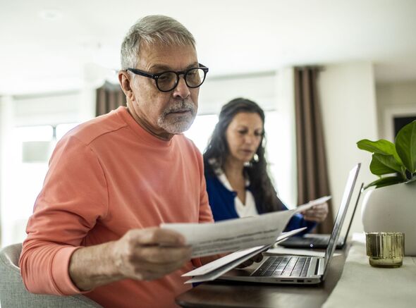 A man checks his finances