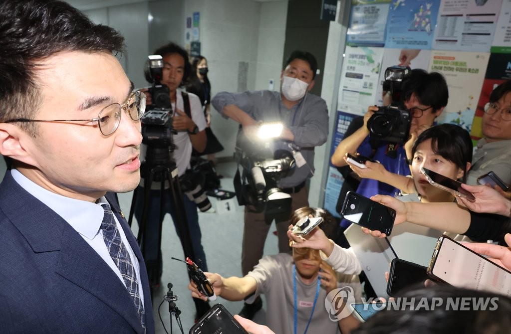 Rep. Kim Nam-kuk (L) appears for a meeting at the Ethics Investigation Advisory Committee regarding his dubious cryptocurrency trading at the National Assembly in Seoul on June 15, 2023. (Yonhap)