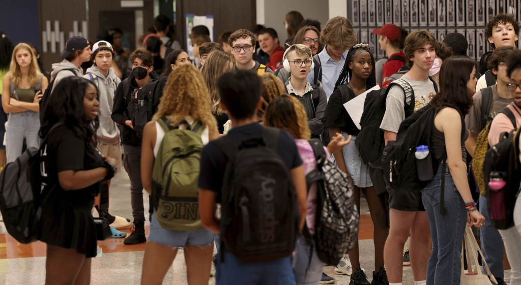 Hundreds of high school students line up and head back to school at Oak Park River Forest High School in Oak Park, Illinois on Aug. 16, 2022. (Antonio Perez/Chicago Tribune/Tribune News Service via Getty Images)