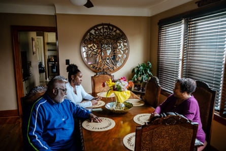 Bethany Howard and her parents in their family home.