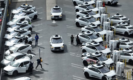 Waymo autonomous vehicles at a staging area in San Francisco this month.