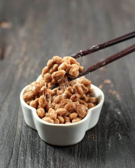 Nattokinase in a bowl with chopsticks