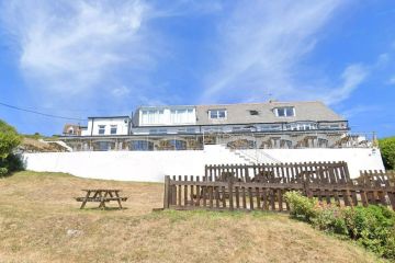 UK pub with its own beach praised for having the 'best views in the country'