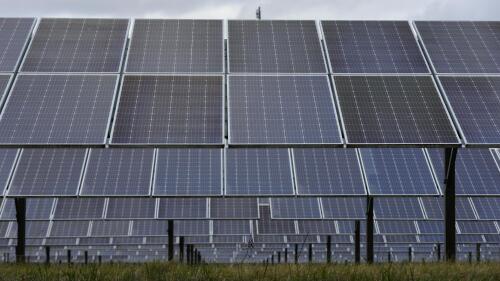 FILE - Solar panels work at the DTE O'Shea Solar Park in Detroit, Nov. 16, 2022. President Joe Biden vetoed on May 16, 2023, a congressional resolution that would have reinstated tariffs on solar panel imports from Southeast Asia, settling for now a long-running dispute over whether to punish China for trade violations that bypass U.S. rules limiting imports of cheap solar panels from Asia. (AP Photo/Paul Sancya, File)