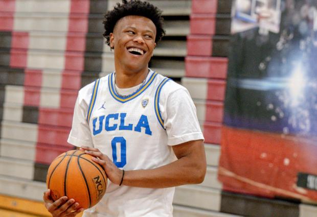 Riverside native and former UCLA basketball player Jaylen Clark smiles...