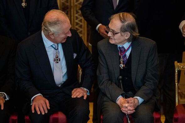 Sir Roger Penrose with King Charles III in 2022