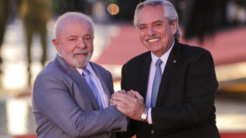 Brazilian President Luiz Inacio Lula da Silva, left, and Argentine President Alberto Fernandez, pose for photos at the Alvorada palace in Brasilia, Brazil, Tuesday, May 2, 2023. AP Photo/Gustavo Moreno)