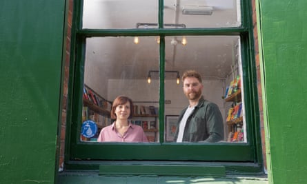 Maria and Clive Judd at the window of Voce Books. 