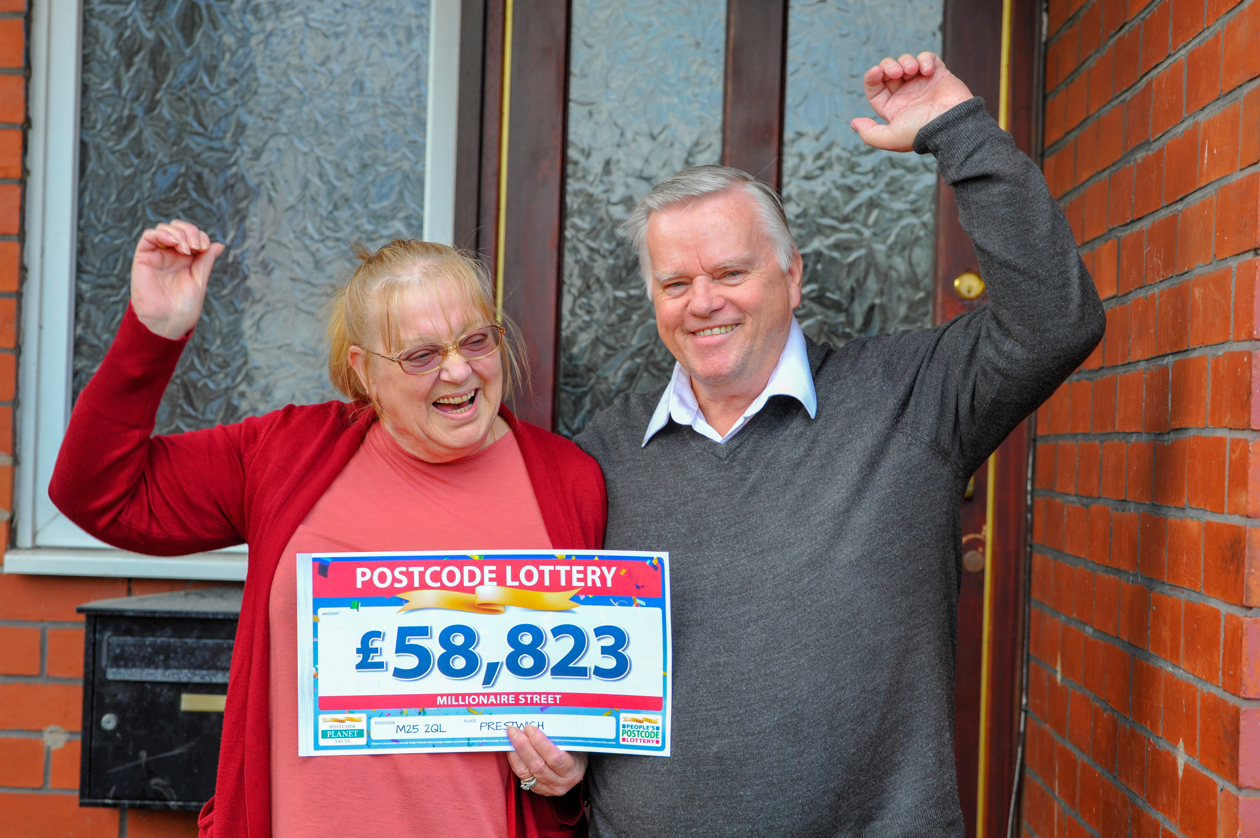 Marilyn and John Boyle celebrating after each member of the family won £58k each