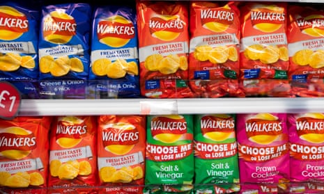 Bags of Walkers crisps on display in a supermarket in Cardiff.