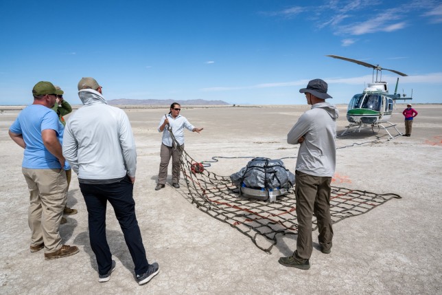 Nasa officials put a big net around the saucer-shaped object.