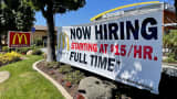 A Now hiring sign at McDonald"u2019s restaurant in Yorba Linda, CA, on Monday, Sept. 13, 2021 offering pay from $15 an hour for new employees as signs around the region are getting the cold shoulder from workers reluctant to resume service-industry jobs."