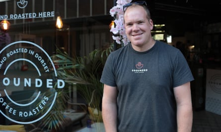 Jon Rowe stands outside his Grounded Coffee shop on Kingland Crescent