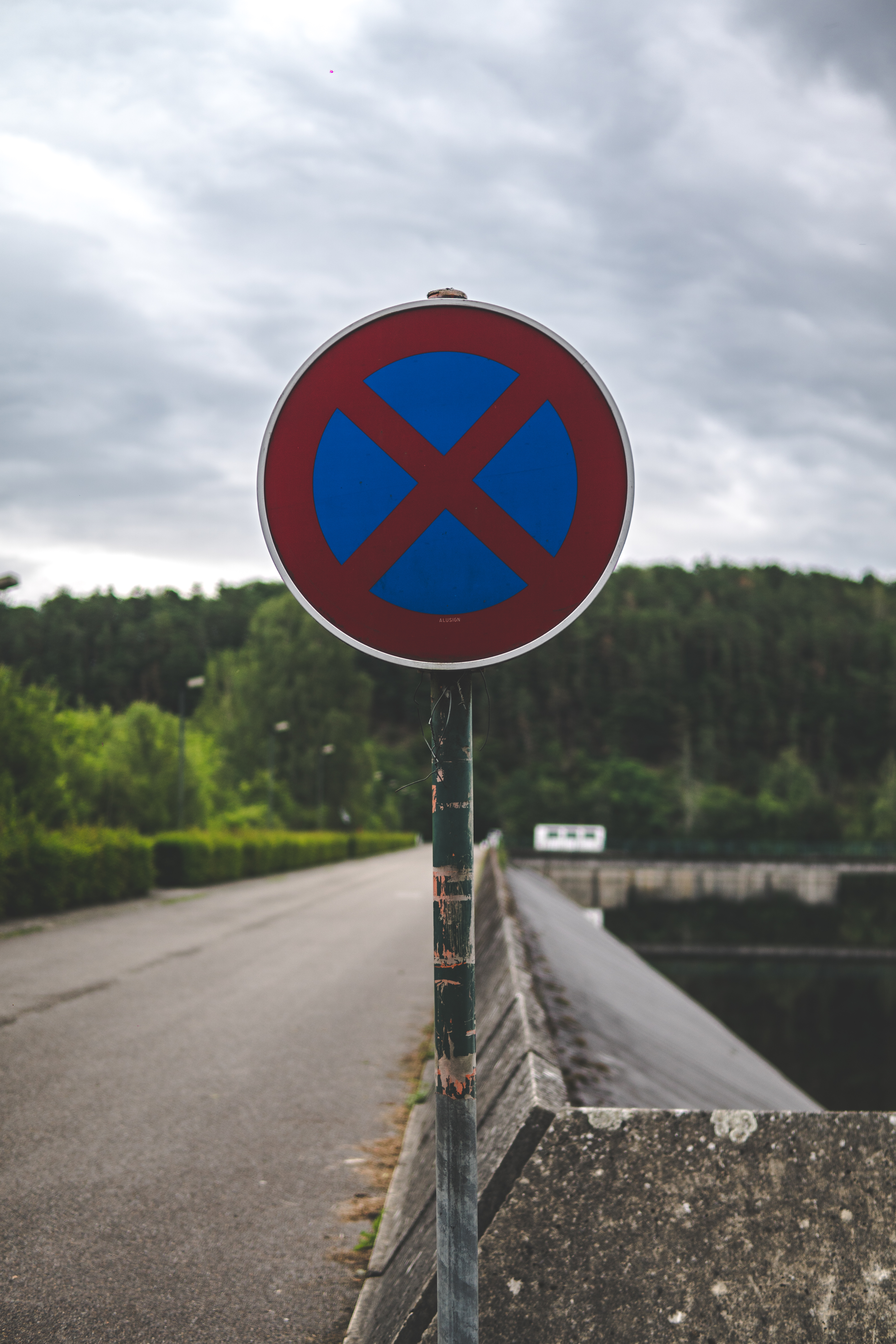 A no stopping traffic road sign means you cannot stop your vehicle in an area.