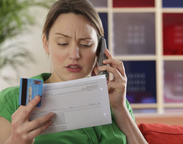 A woman checks her finances