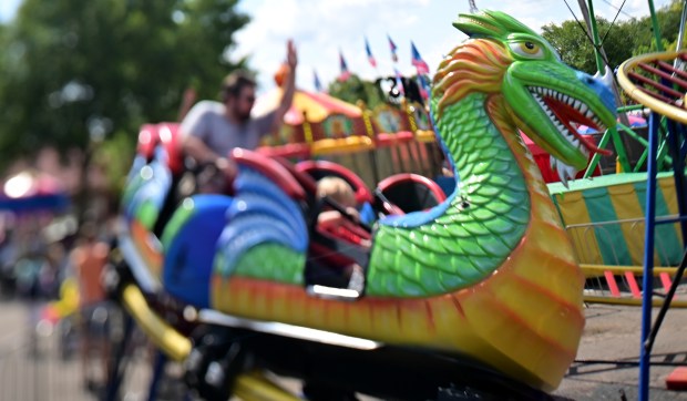 A dragon car on a carnival ride