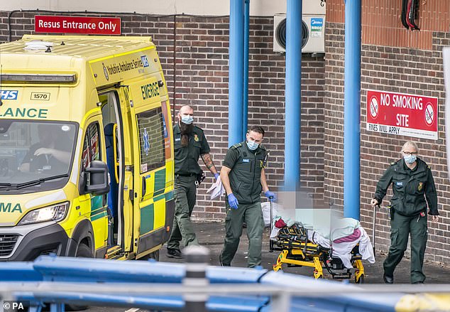 A file photo of paramedics with a patient outside Doncaster Royal Infirmary in Yorkshire on January 8