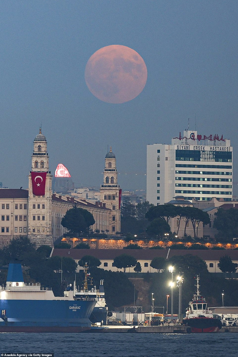 TURKEY: A view of supermoon above Selimiye Barracks and waterfront buildings in Istanbul