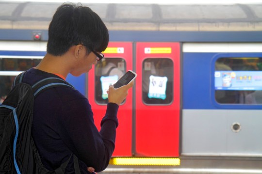 Chinese boy on phone