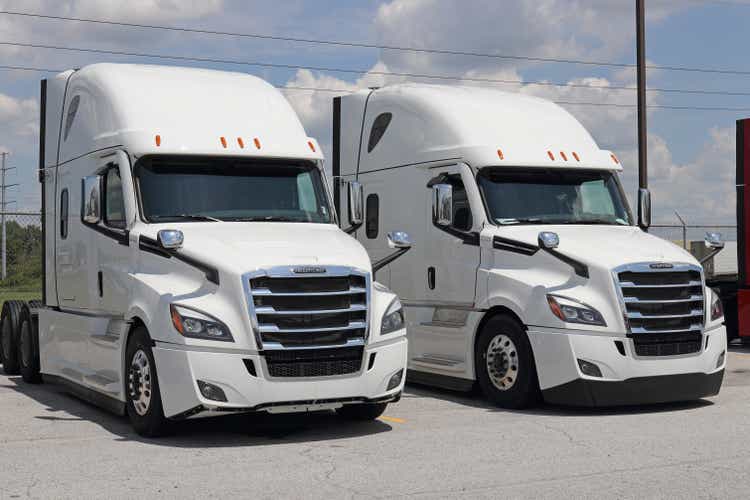 Freightliner Semi Tractor Trailer Trucks Lined up for Sale. Freightliner is owned by Daimler Trucks.