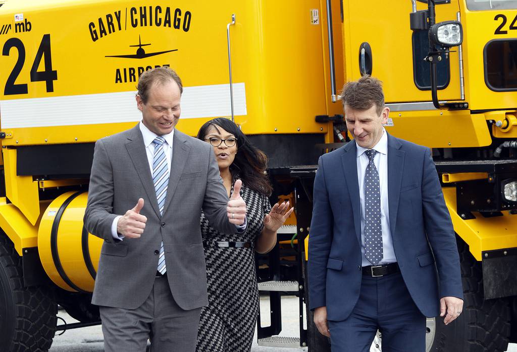 A very happy Daniel F. Vicari, (left) Executive Director of the Gary/Chicago International Airport walks with Joy Holliday, Chief of Staff City of Gary (center), and U.S. Rep. Frank J. Mrvan, D-Highland, after a ceremony that commemorated  million in federal funds to support air cargo infrastructure at the Gary/Chicago International Airport in Gary on Wednesday April 5, 2023. (John Smierciak/ Post Tribune)