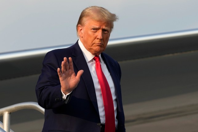 Former President Donald Trump arriving for his Georgia arrest