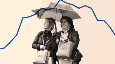 Two women under an umbrella with a graph line in the background