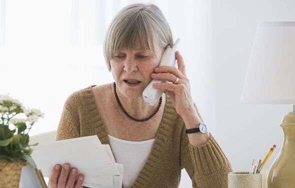 A woman checks her bills