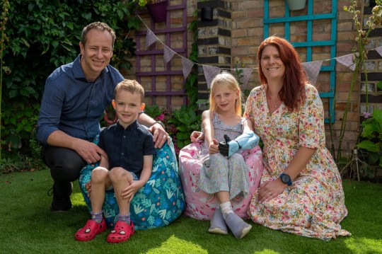 Caitlin with her parents Maria and Terry, and her brother Benjamin, aged 5