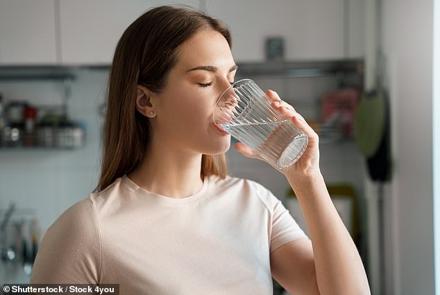 Instead of drinking caffeine and alcohol people should  drink water. Feeling thirsty, dark yellow pee, feeling dizzy and having sunken eyes are all signs of dehydration in children and adults, according to the NHS