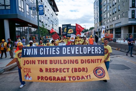 Construction workers participate in Dignity and Respect March in June 2022.