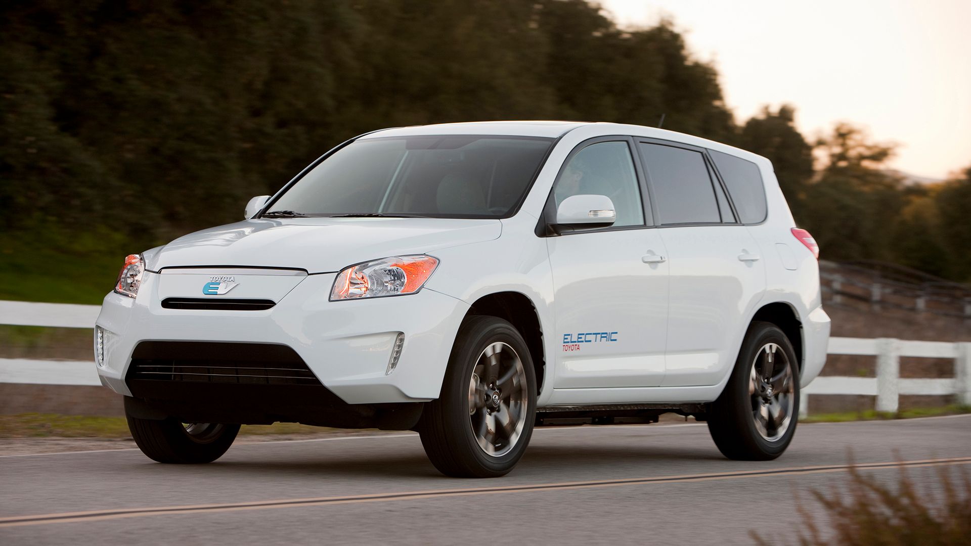 Front 3/4 view of a white 2010 Toyota Rav4 Demonstration EV