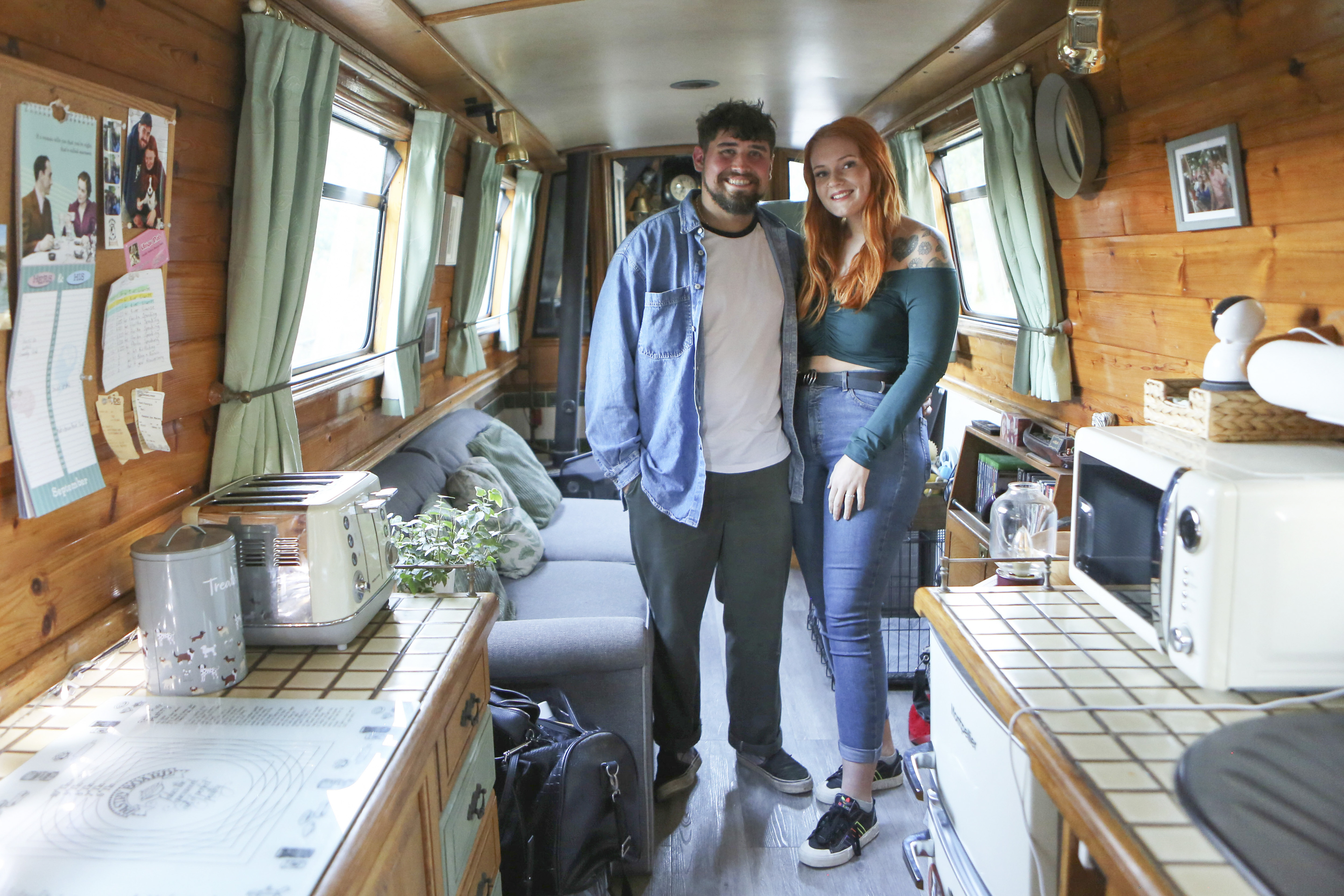 The tiny kitchen is perfectly sized for the couple