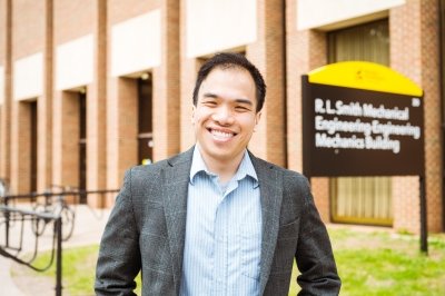 The new coordinator for a department of commerce cooperative agreement called NIST PREP stands in front of the MEEM building on the Michigan Tech campus.