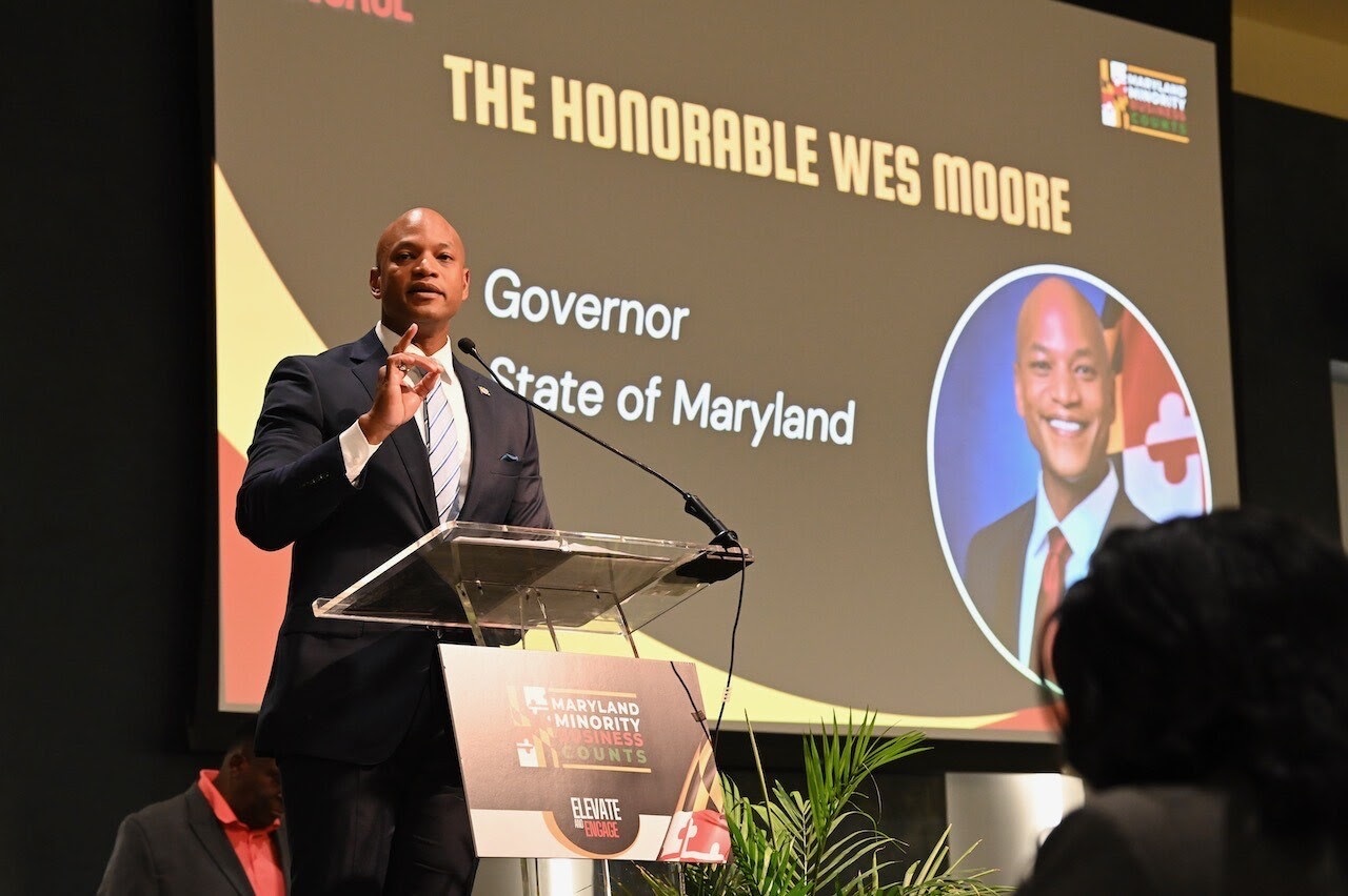 Governor Moore speaking at podium