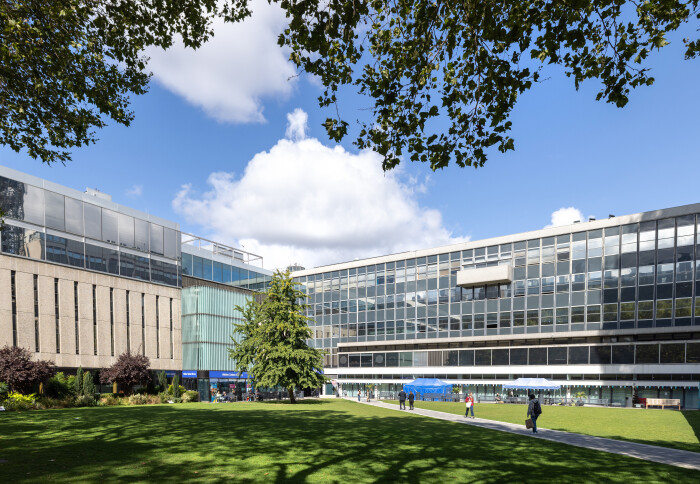 A photo of the Abdus Salam Library and other campus buildings