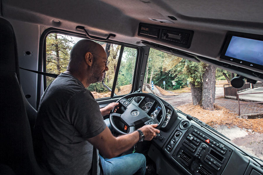 Matt Prior driving a Unimog through a forest