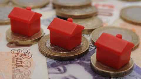 Property ladder research...Embargoed to 0001 Tuesday April 21 File photo dated 27/01/15 of plastic models of houses sit on a pile of coins and bank notes, as research from Shelter suggests that nearly half of parents whose children have not bought a home think their only hope of getting on the property ladder is to wait for an inheritance from them. PRESS ASSOCIATION Photo. Issue date: Tuesday April 21, 2015. Some 49% of more than 1,000 parents surveyed for the charity said they &quot;strongly agree&quot; or &quot;tend to agree&quot; that the inheritance windfall left by them will be the only way their children will ever be able to get on the first rung of the property ladder. See PA story MONEY Housing. Photo credit should read: Joe Giddens/PA Wire