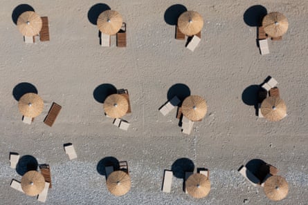 Aerial view of empty sun loungers on a beach at a resort in Rhodes, Greece