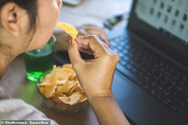 A quarter of people are undoing the benefits of healthy meals with unhealthy snacks that raise the risk of heart disease and stroke, a study suggests (Stock Image)