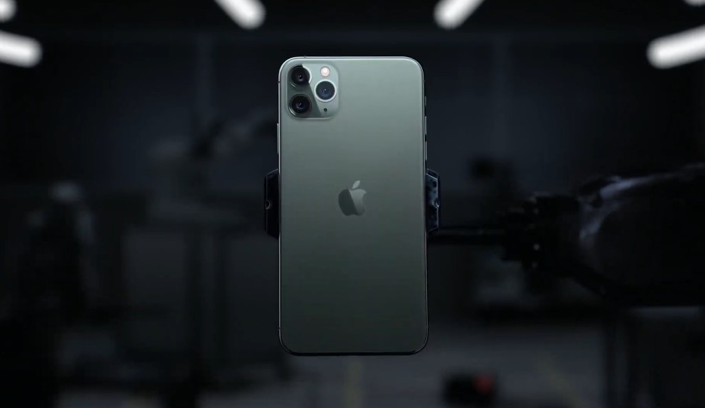 a photo of the iPhone 11 Pro on a darkened background