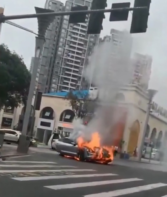 The footage of what is believed to be a Porsche Taycan bursting into flames on a busy street in China