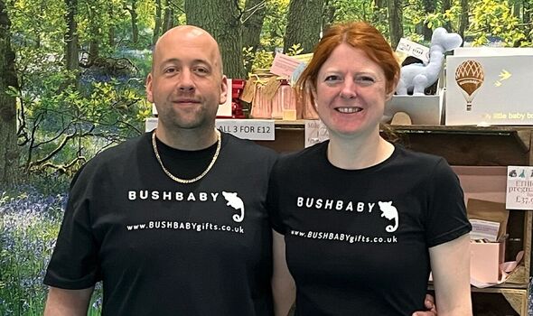 Jill and Mark standing with Bushbaby products