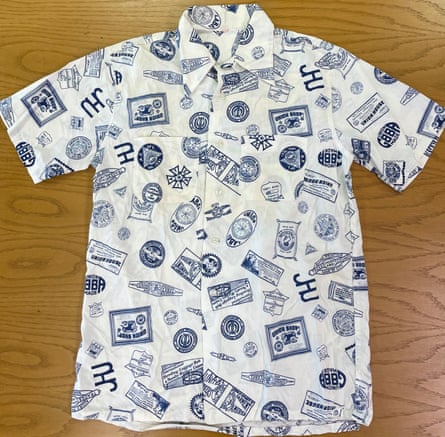 A shirt owned by Walter Reuther that features logos of various unions.